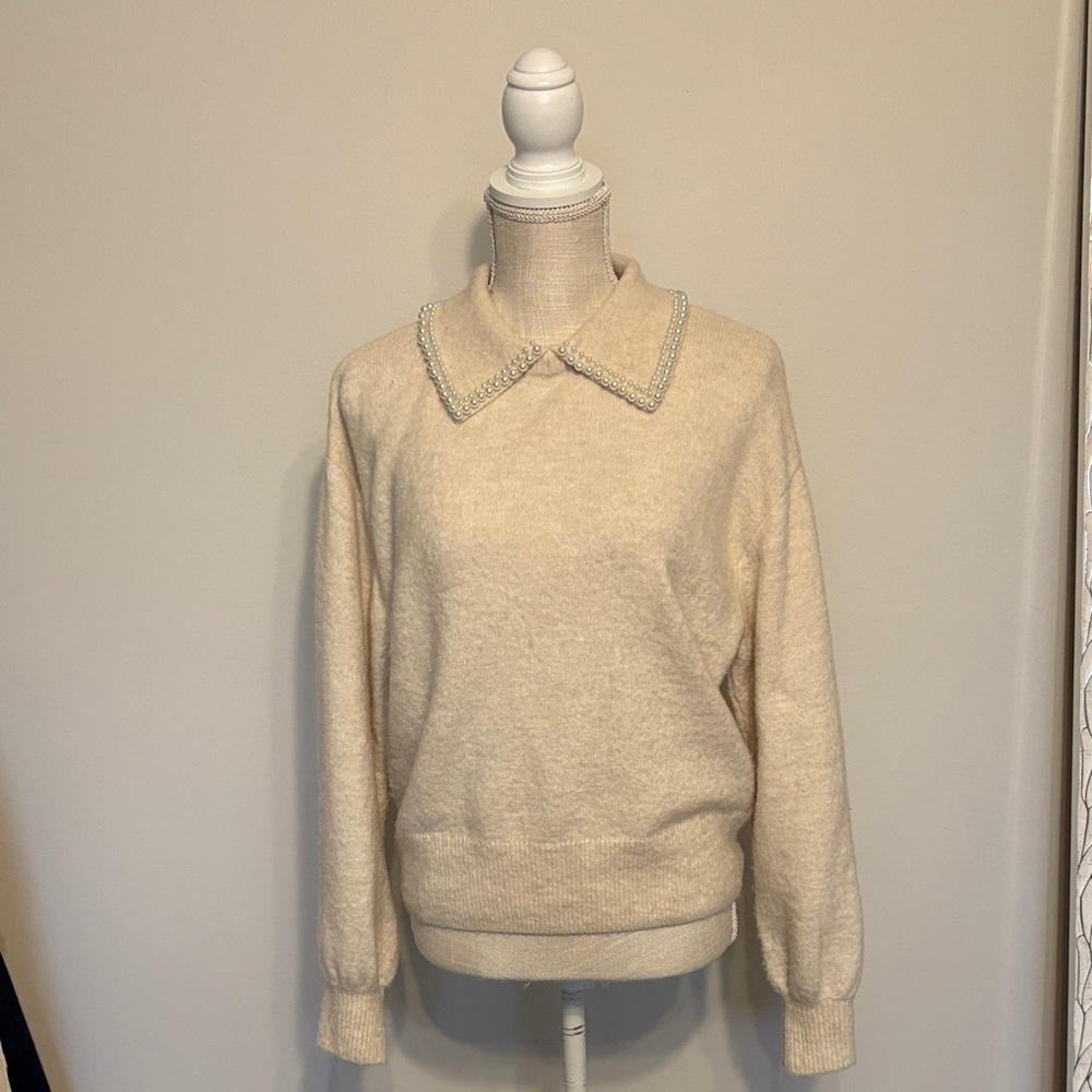 Elegant Cream Sweater with Embellished Collar